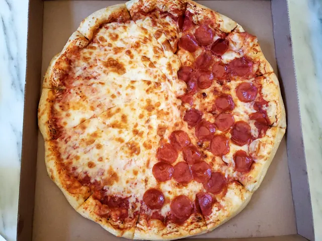 Costco whole pizza, half cheese and half pepperoni